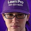 Smiling professional headshot of a GreenPal lawn care vendor