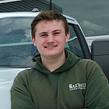 Professional headshot of a GreenPal lawn care vendor