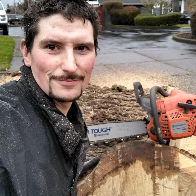 A Cut Above Tree And headshot