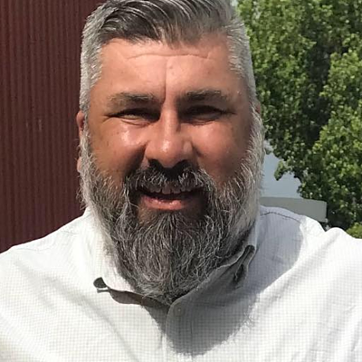 Generic placeholder icon of a person's head and shoulders