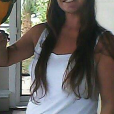 Smiling headshot of a professional landscaper with a beard