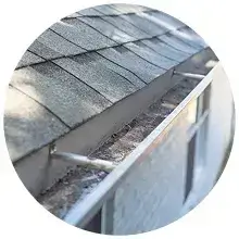 A clean gutter flowing freely on a home in Oceanside, CA