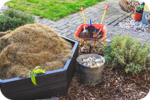 Proactively refreshed flower beds with new mulch after spring yard cleanup in Ithaca