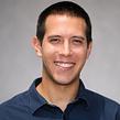 Headshot of a smiling male lawn care professional.