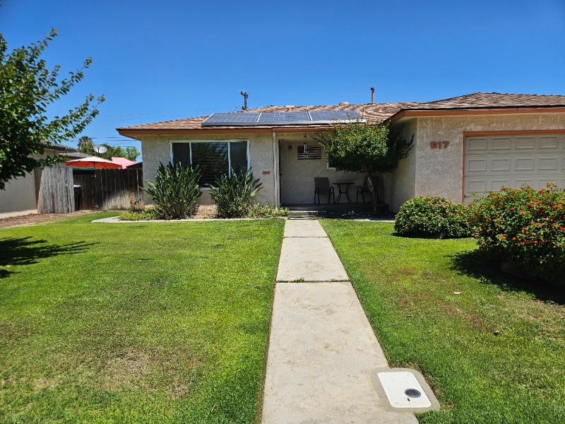 Lawn mowing work by Low Cost Landscaping in Fresno, CA