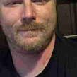 Professional headshot of a GreenPal lawn care vendor