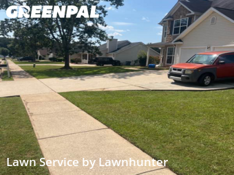 Garden Trimming in Covington, 30016, Front Yard Mowing by Lawnhunter, work completed in Nov , 2025