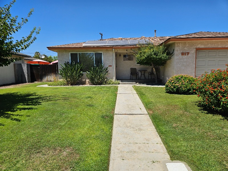 Lawn mowing work by Low Cost Landscaping in Clovis, CA